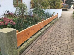 Vorgartenzaun Hundemotive Vorgartenzaun mit Hundemotiven Gesamtansicht